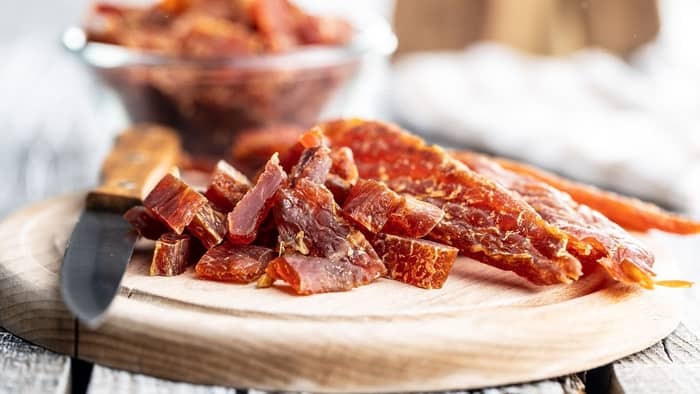  How do you cut chicken breast for jerky?